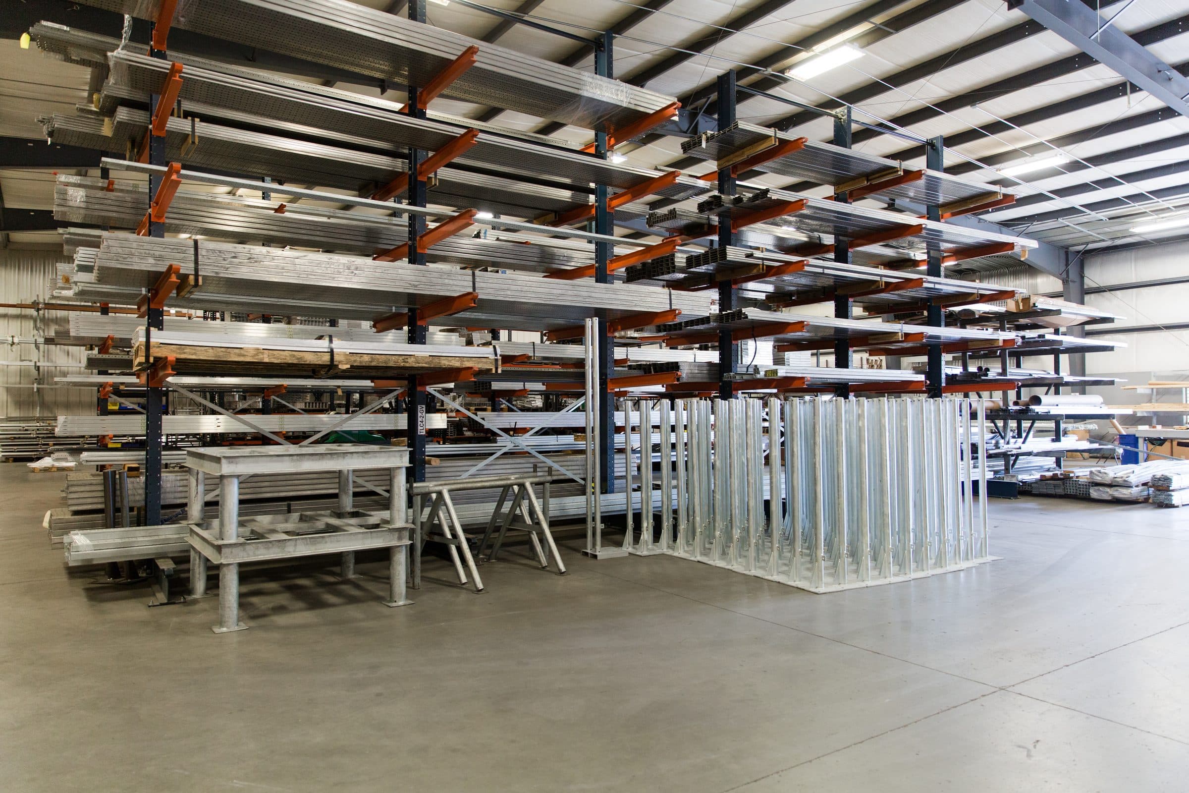 TechLine Manufacturing warehouse floor with instrument stands and inventory on cantilever racks